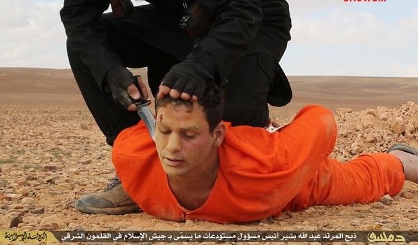 عکس/ وحشیانه‌ترین شیوه اعدام داعش 